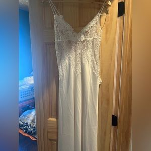 Bridal slip never worn! Size large. Comes with thong